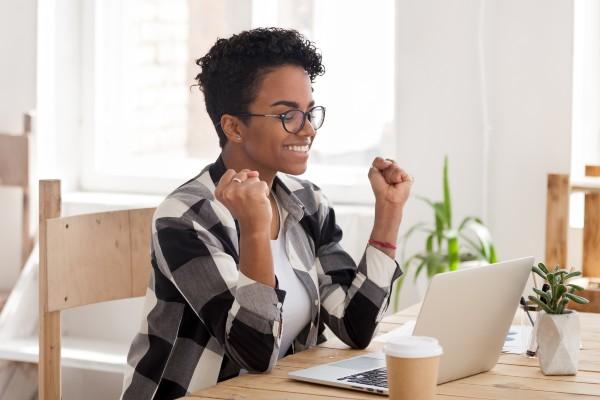 Woman happy her trip has been approved