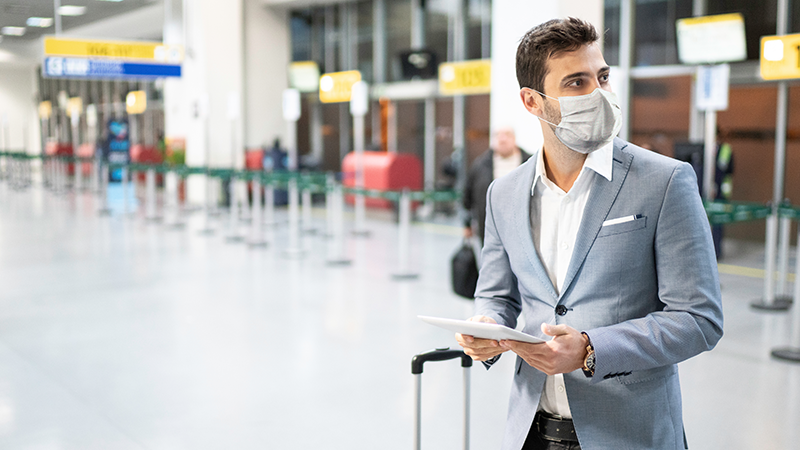 HW Man in mask at airport